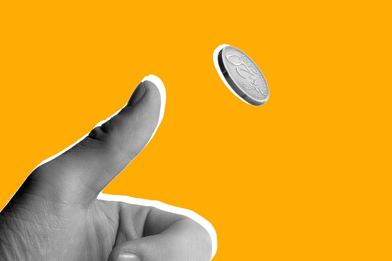 Hand flipping a coin.
