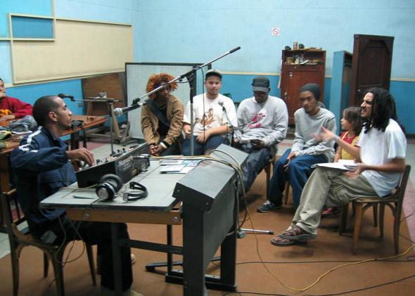 Ariel Fernandez aka DJ Asho hosting his weekly show "Microfonazo" at Radio Pogreso in 2004, with Doble Filo and Obsesion. 