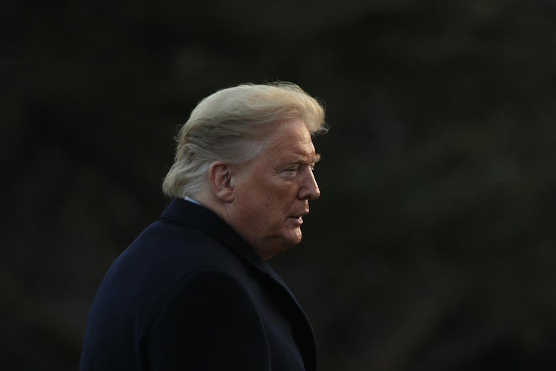 President Donald Trump waves as he walks on the South Lawn after he returned to the White House February 7, 2020 in Washington, D.C.