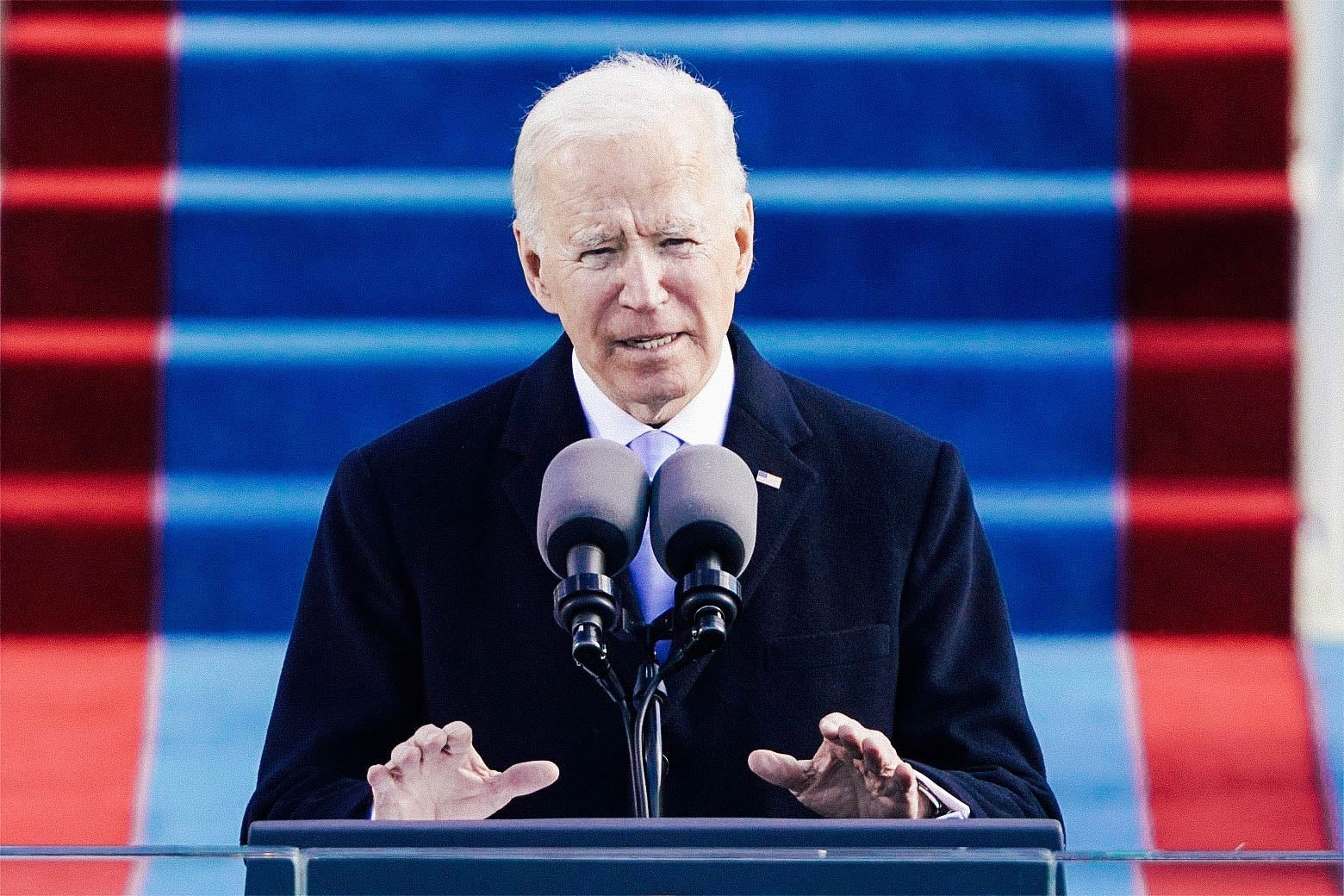 Joe Biden speaks into a microphone.
