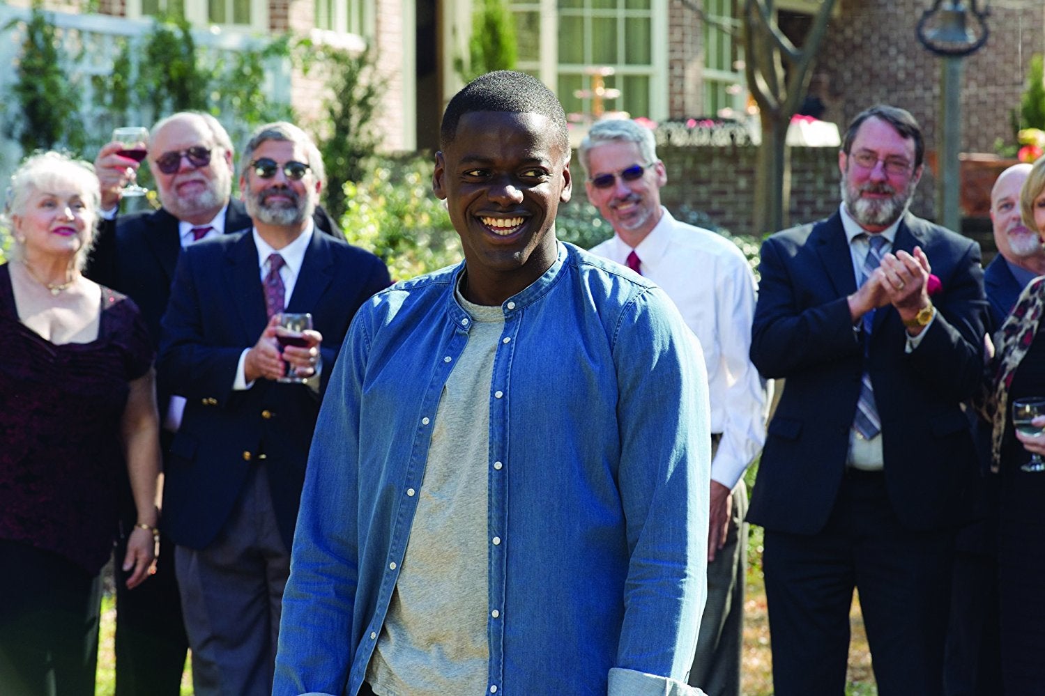 Daniel Kaluuya as Chris, and as "Chris," in Get Out.