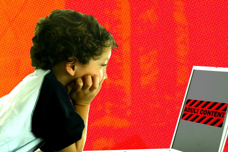 A little boy looks at a computer screen that shows a sign saying "Adult Content."