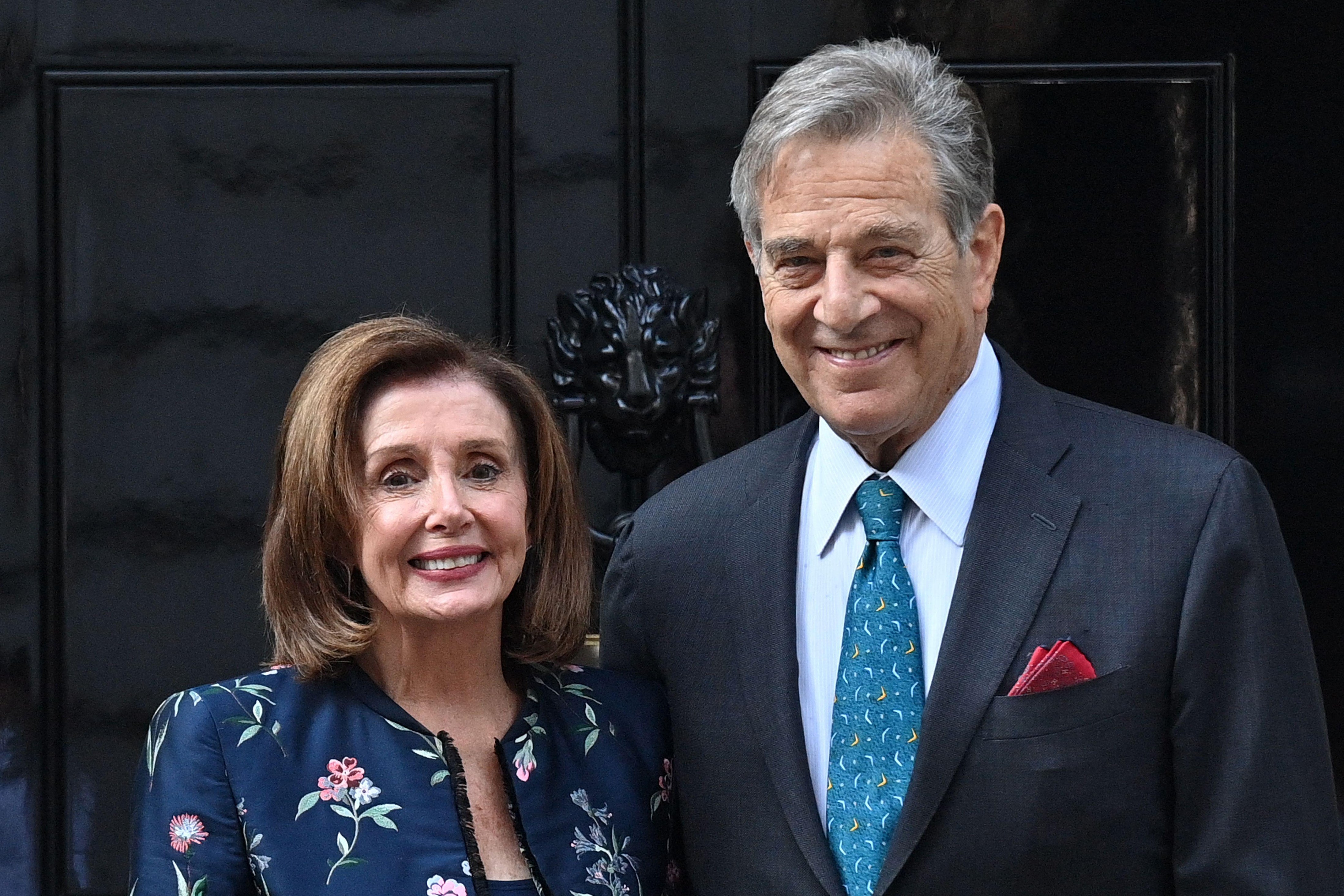 A photo of the US Speaker of the House, Nancy Pelosi, and her husband Paul Pelosi, in front of 10 Downing Street in the U.K.