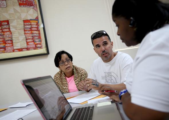 Procrastinators flood Obamacare exchanges ahead of Monday deadline.