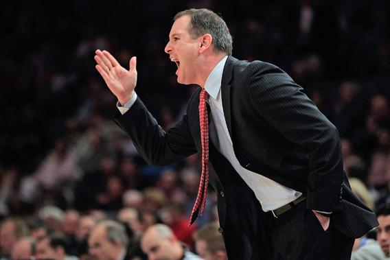 Rutgers head coach Mike Rice gestures from the bench during a game against the St.Johns Red Storm during the second round of the 2011 Big East Men's Basketball Tournament at Madison Square Garden on March 9, 2011 in New York City.  