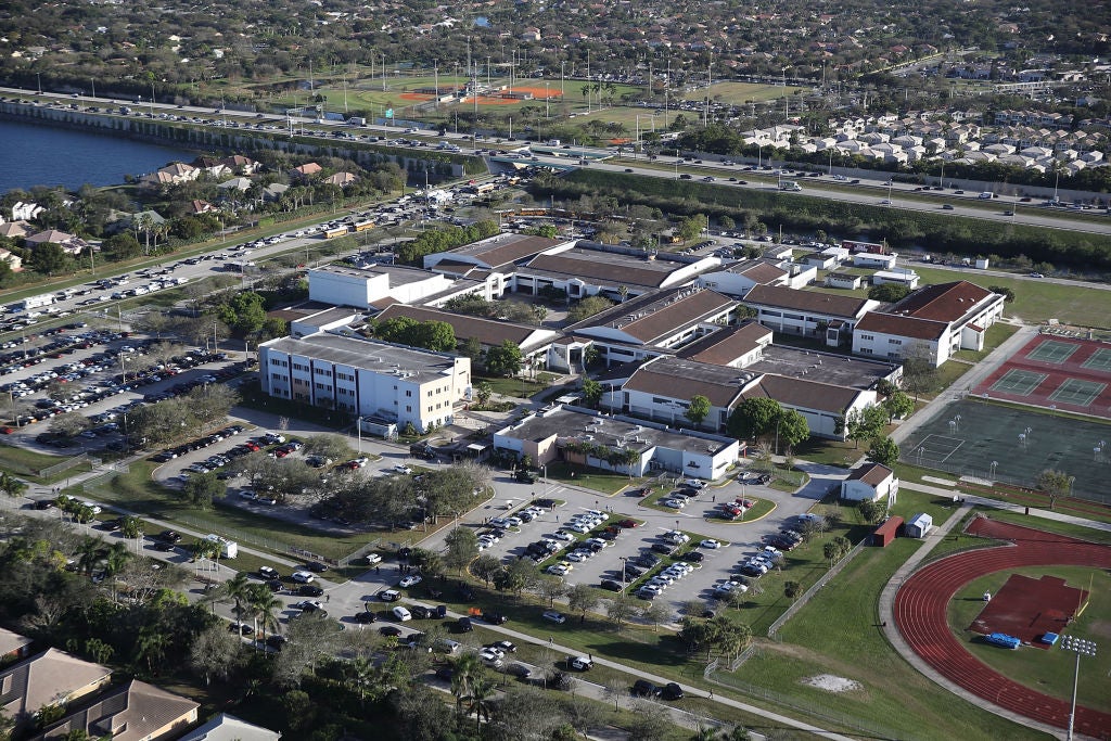 Parkland school officer says he thought shooting was outdoors.