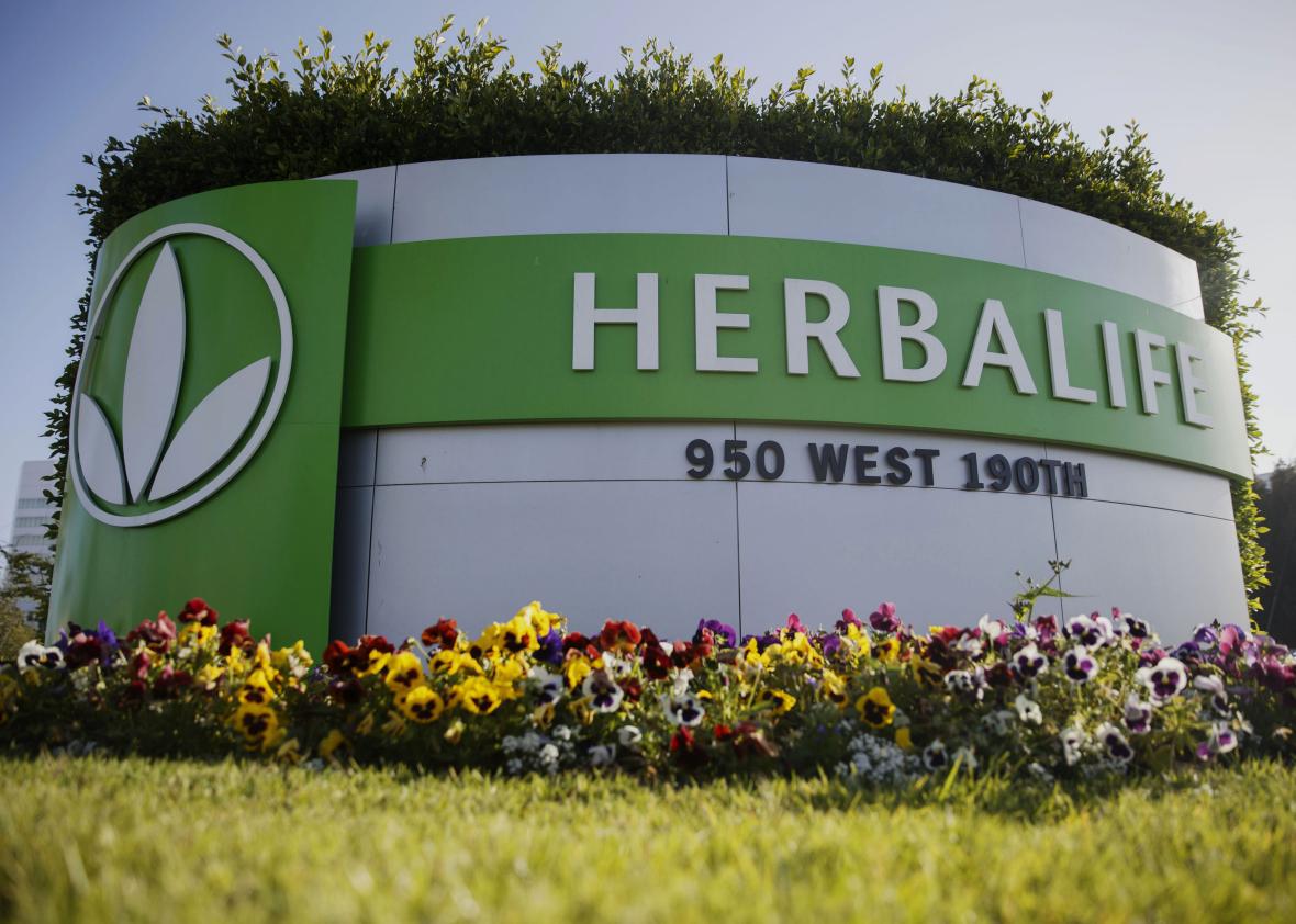 Signage stands outside of the Herbalife Ltd. Plaza in Torrance, California, U.S., on Sunday, May 1, 2016. Herbalife Ltd. is scheduled to release earnings figures on May 5.