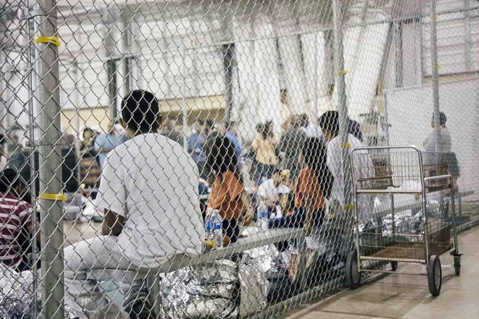 Migrants in a detention facility