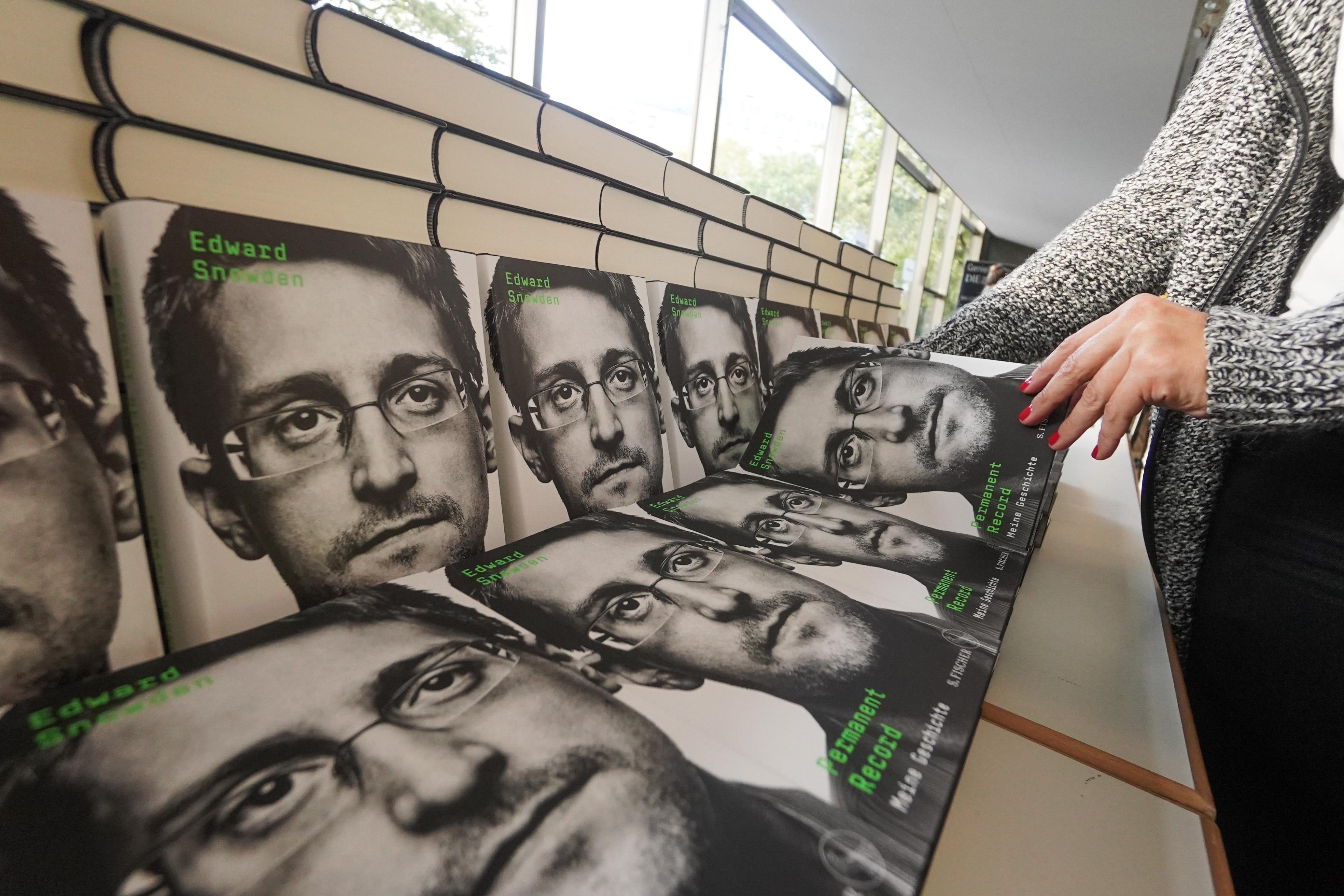 Copies of Edward Snowden's new book during an appearance via video conference.