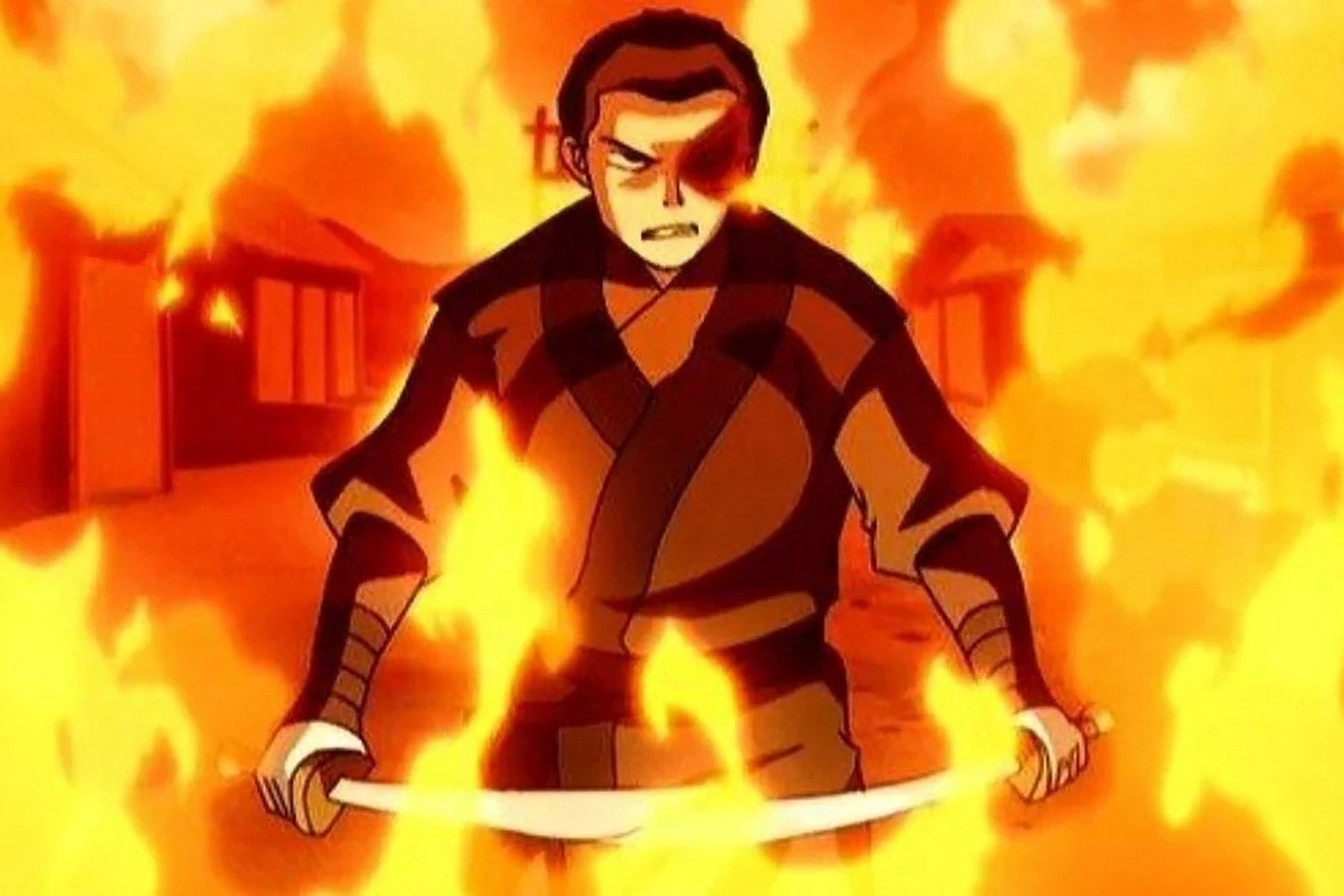 A boy dressed as a samurai walks through flames.