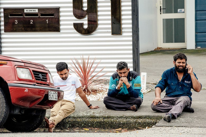Grieving members of the public following a shooting at the Al Noor Mosque in Christchurch, New Zealand.