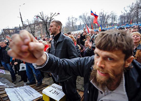 Pro-Russian protesters attend a rally in front of the seized office of the SBU state security service in Luhansk, eastern Ukraine.