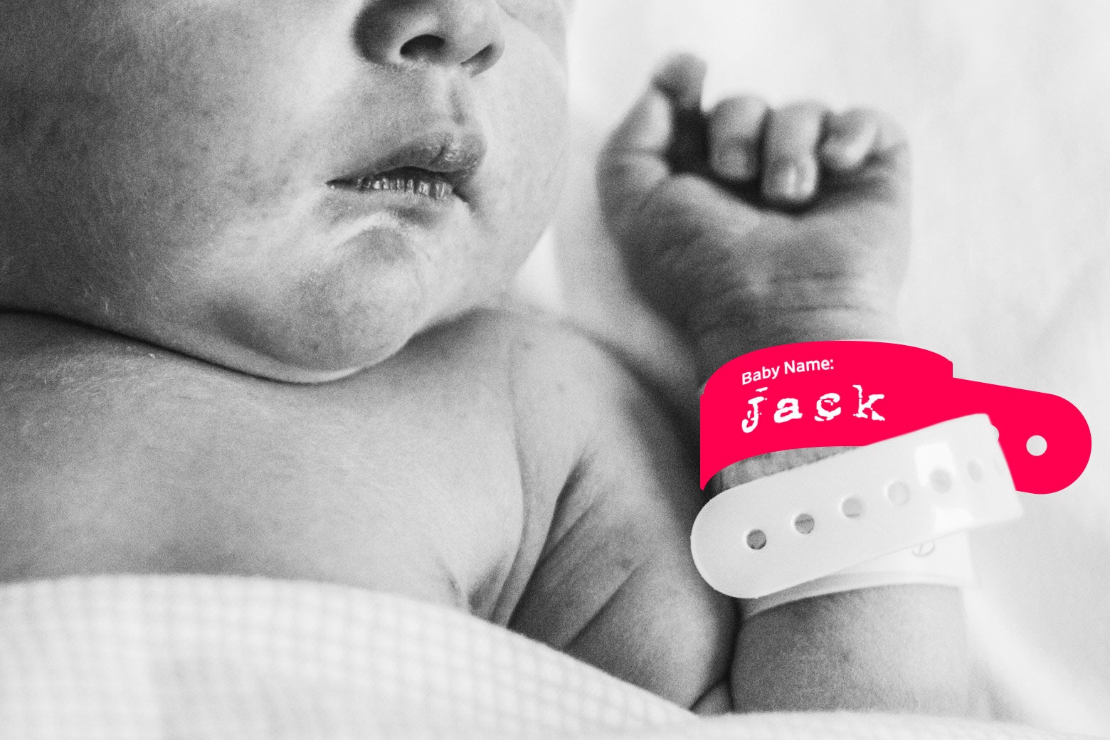 Newborn at a hospital with a wristband that says Jack.