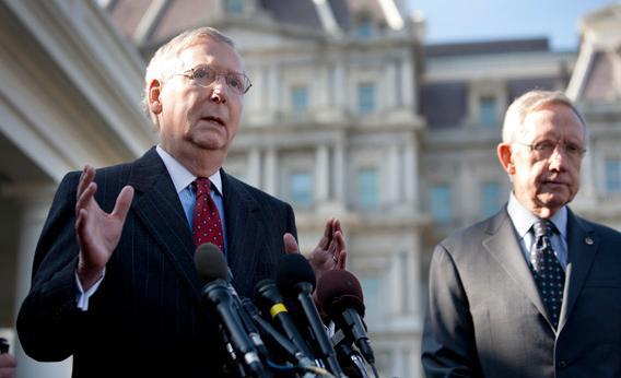 Senate Minority Leader Mitch McConnell (R-KY), accompanied by Senate Majority Leader Harry Reid.