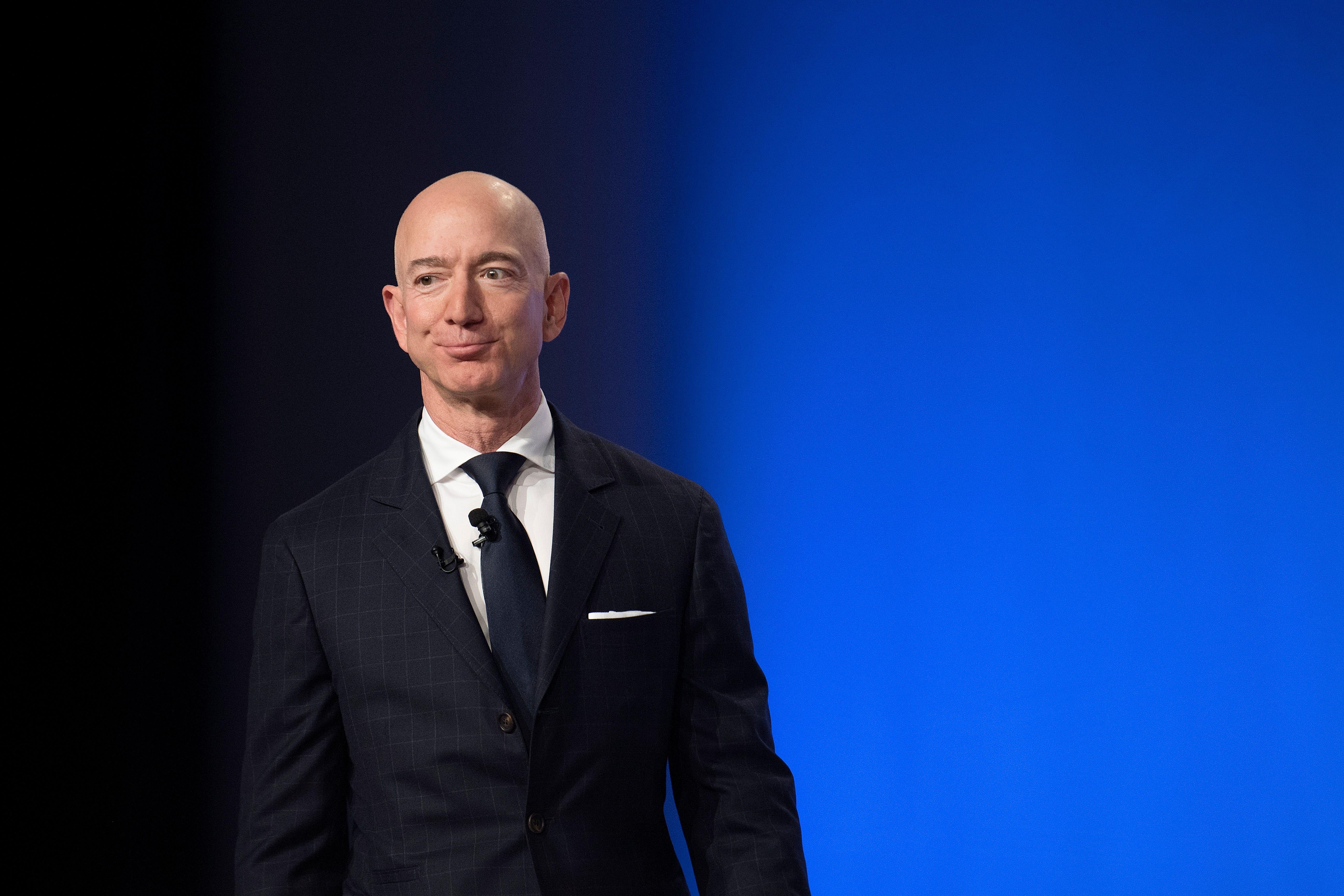 Amazon and Blue Origin founder Jeff Bezos provides the keynote address at the Air Force Association's Annual Air, Space & Cyber Conference in Oxen Hill, MD, on September 19, 2018. (Photo by Jim WATSON / AFP)        (Photo credit should read JIM WATSON/AFP/Getty Images)