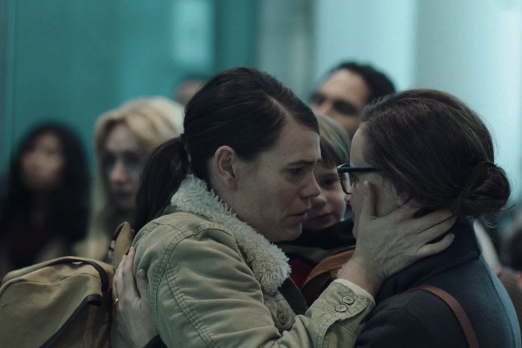 Clea DuVall and Alexis Bledel as Sylvia and Emily in The Handmaid's Tale.