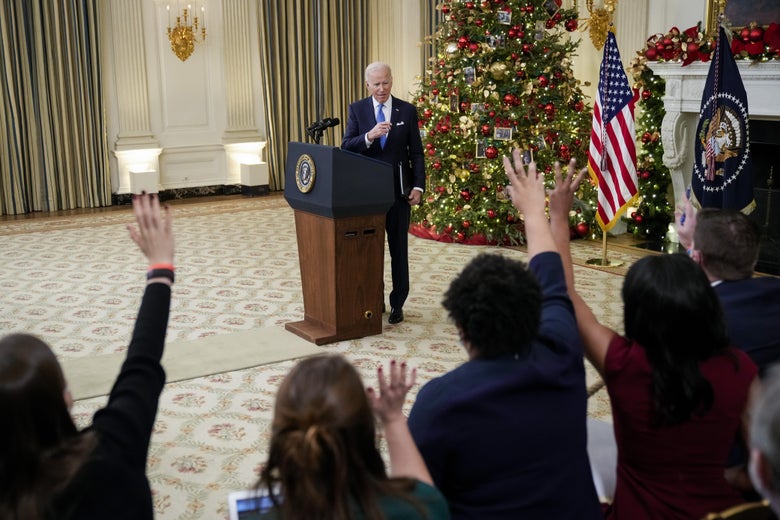 President Joe Biden takes questions from reporters as he speaks about the omicron variant of the coronavirus in the State Dining Room of the White House, December 21, 2021 in Washington, D.C.