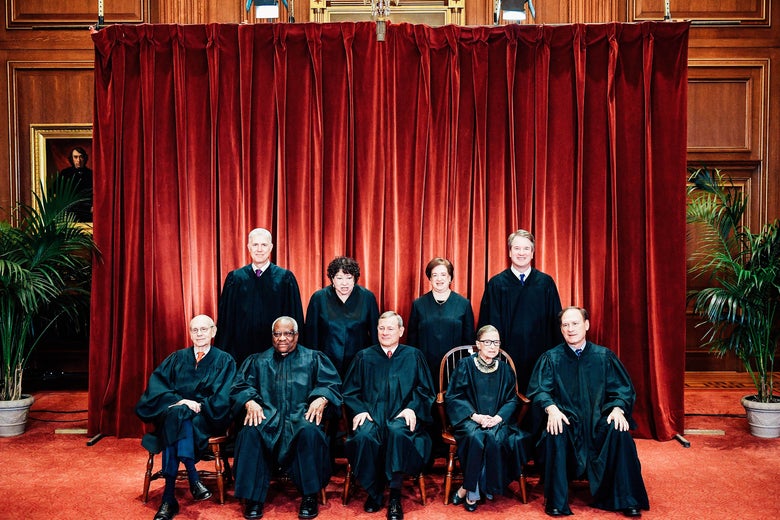 Justices of the Supreme Court pose for their official photo.