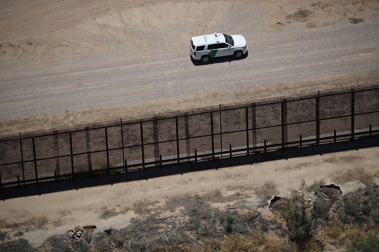 A U.S. Border Patrol vehicle is seen along the U.S./Mexico border fence on June 19, 2018 in Tornillo, Texas.