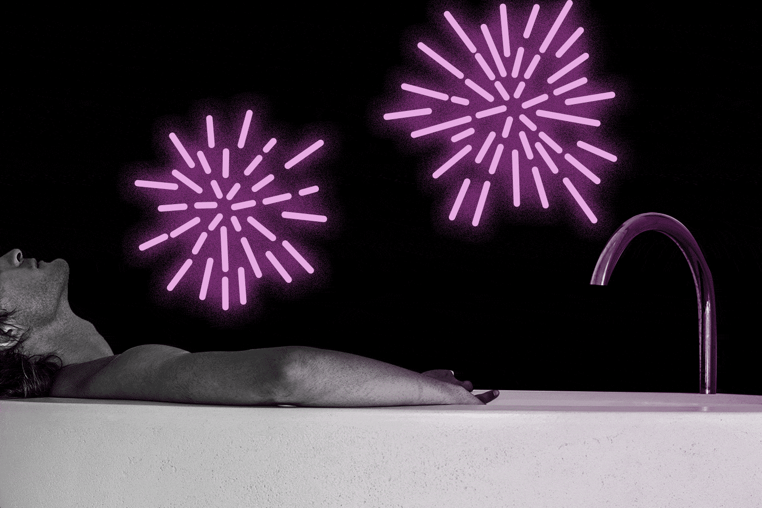 A man in the bath, with fireworks exploding over him. 