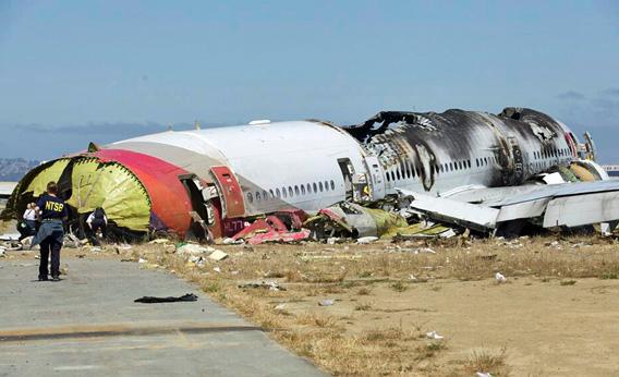 U.S. National Transportation Safety Board photo shows the wreckage of Asiana Airlines Flight 214 that crashed at San Francisco International Airport in San Francisco, California in this handout released on July 7, 2013.