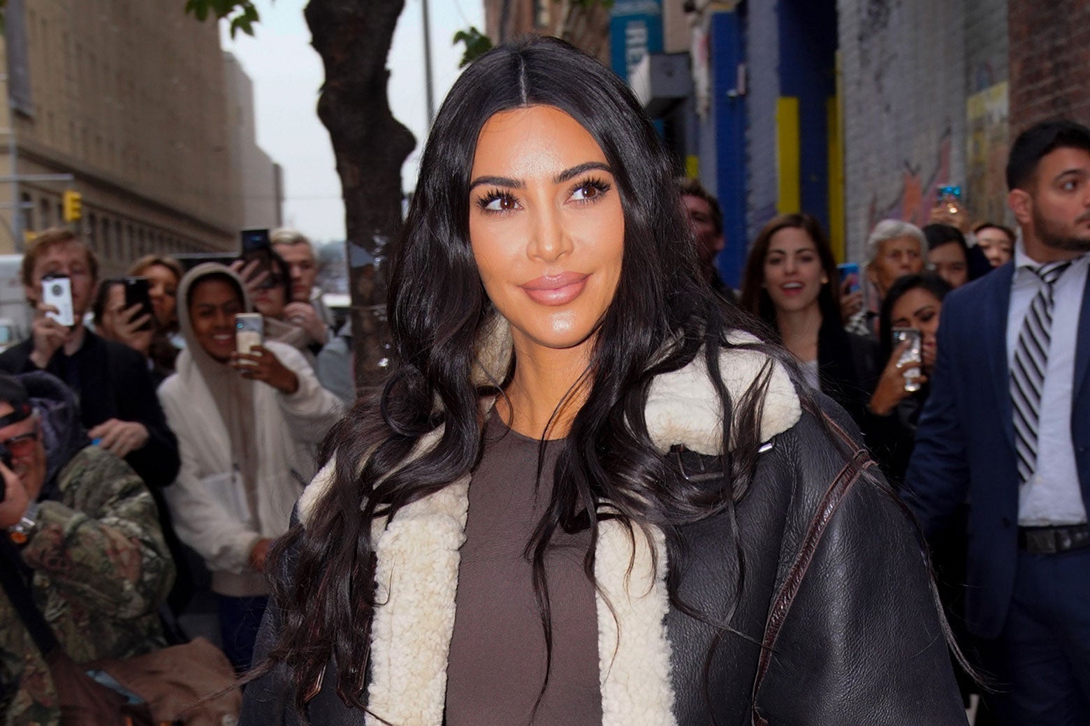 Fans snap photos of Kim Kardashian West on the street.