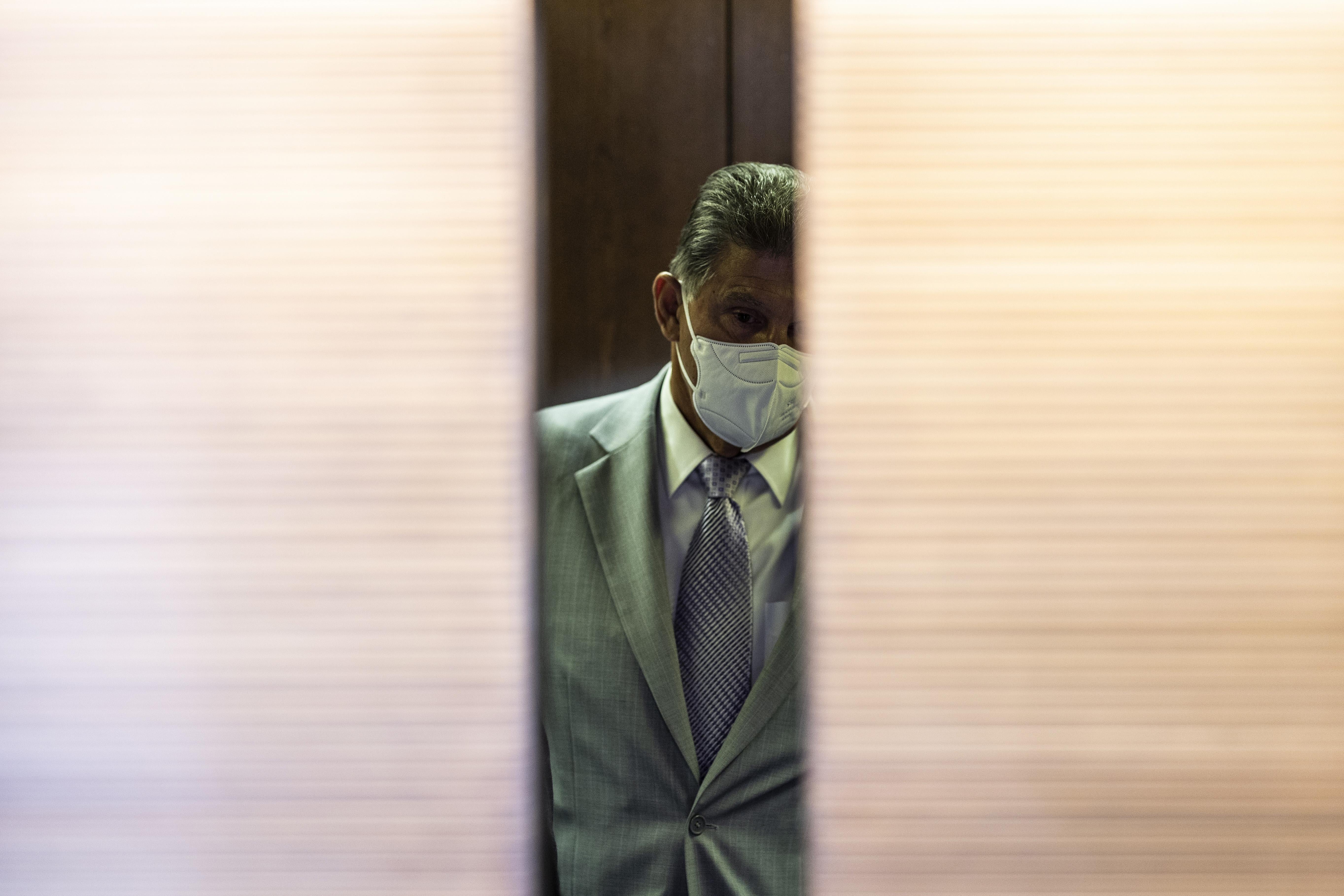 WASHINGTON, DC - AUGUST 02: Sen. Joe Manchin (D-WV) rides in an elevator after speaking to reporters outside of his office in the Hart Senate Office Building on August 02, 2022 in Washington, DC. Negotiations in the U.S. Senate continue for the Inflation Reduction Act of 2022. (Photo by Anna Moneymaker/Getty Images)