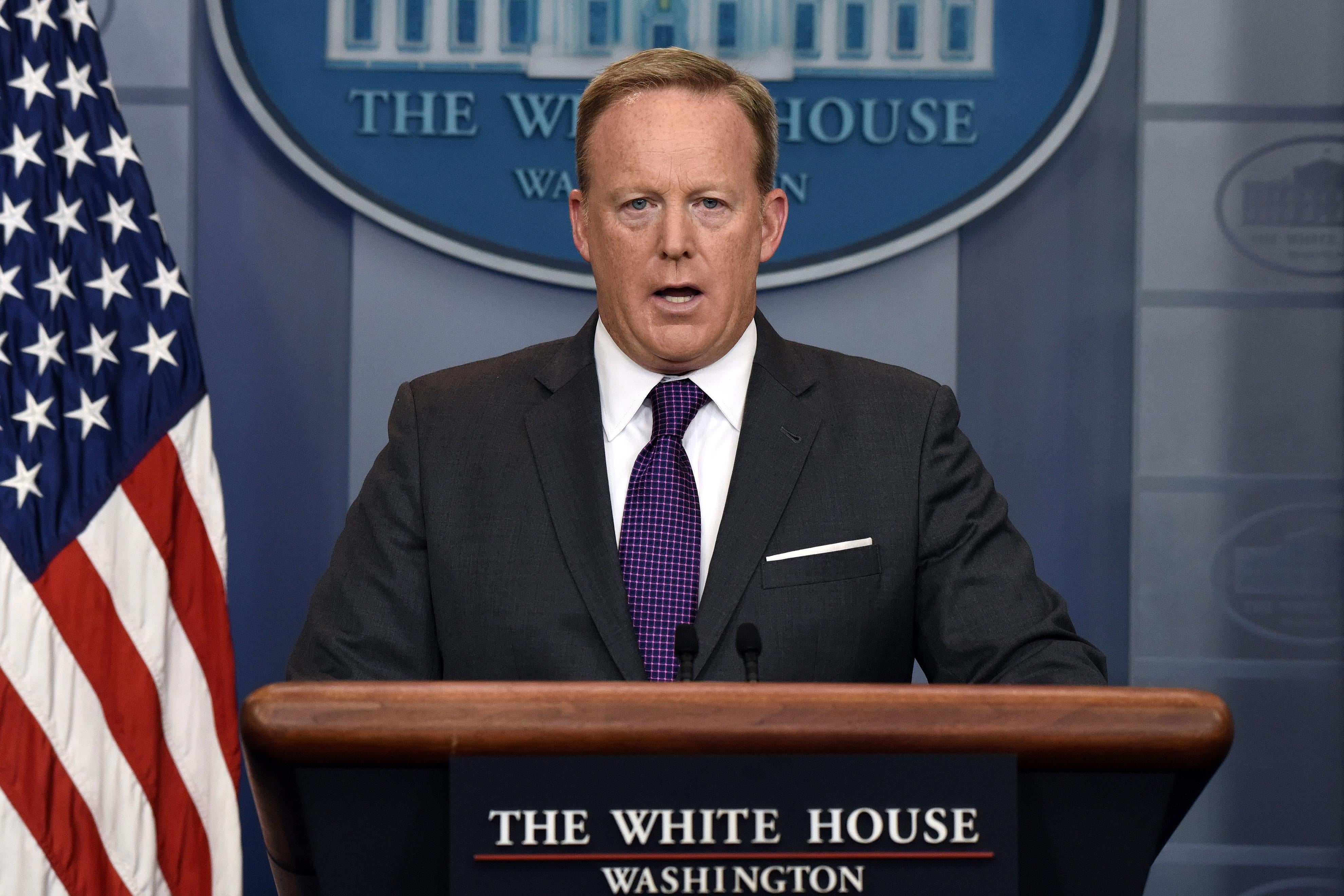 Then-White House Press Secretary Sean Spicer at the podium delivering the daily briefing at the White House on July 17, 2017 in Washington, DC.