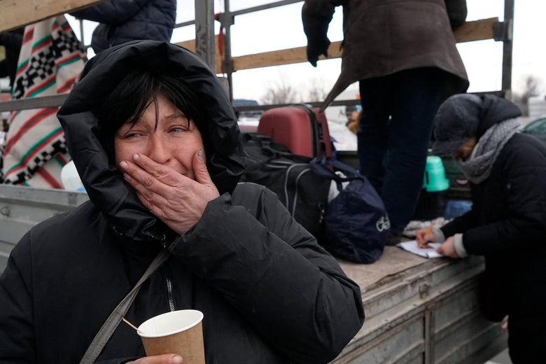 Evacuees from Mariupol are seen upon arrival on the outskirts of the city of Zaporizhzhia, which is now a registration center for displaced people, on March 16, 2022. 