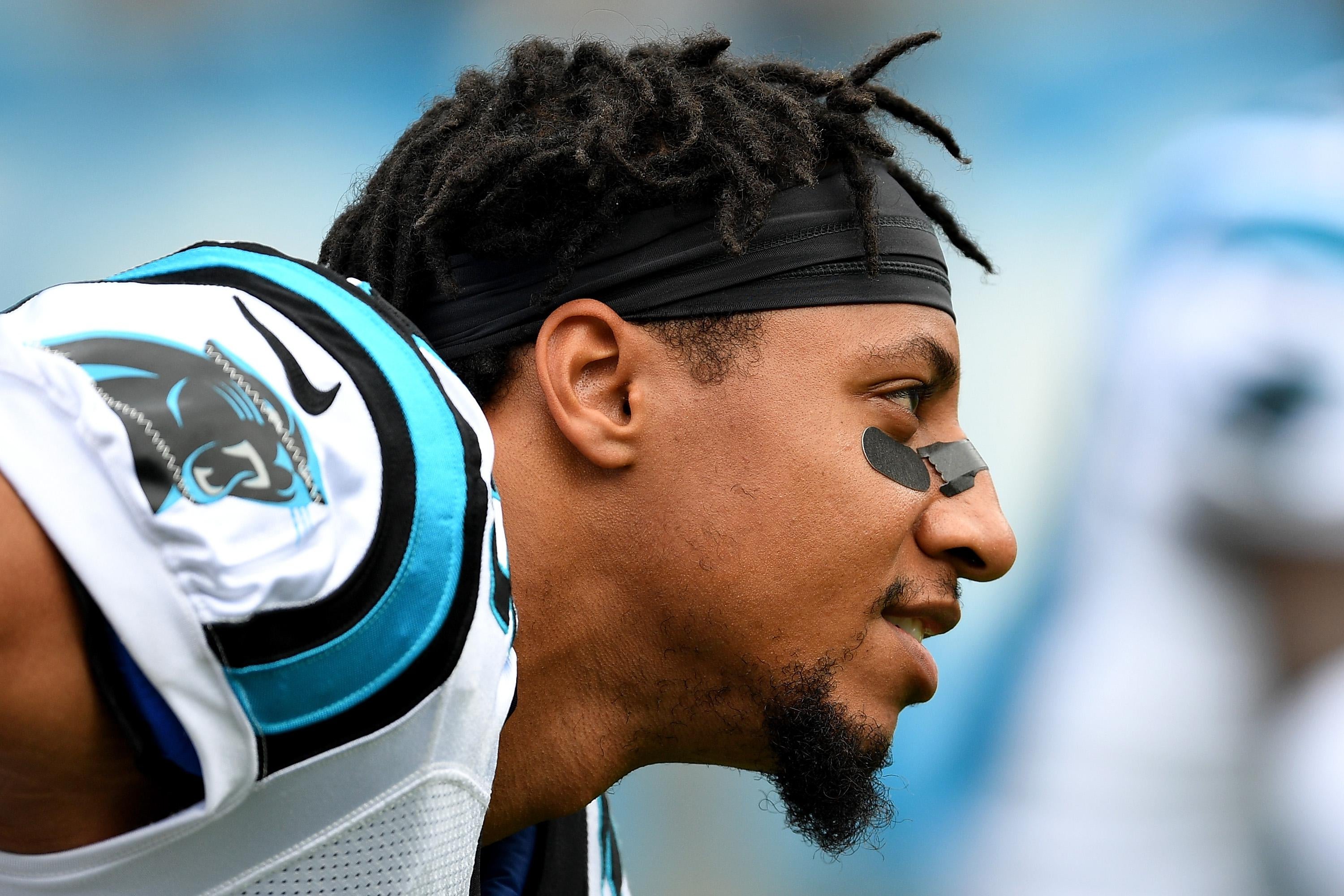 Carolina Panthers strong safety Eric Reid (25) kneels along the