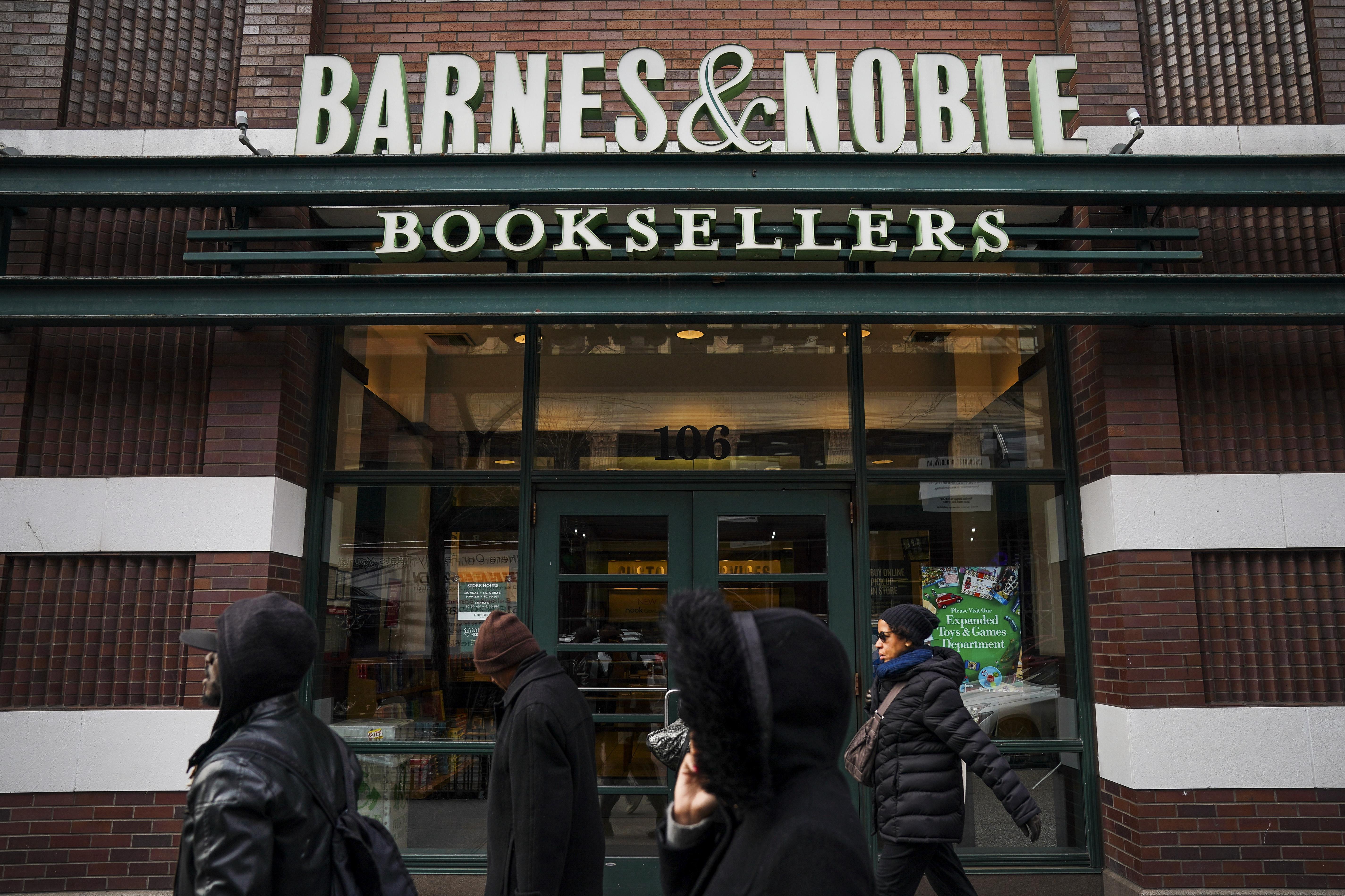 People walk by a Barnes & Noble bookstore.