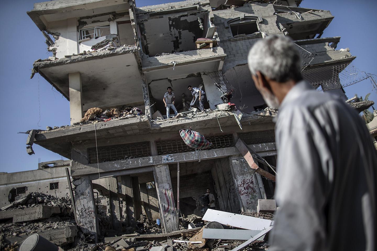 Gaza City as families returned to find their homes ground into rubble by relentless Israeli tank fire and air strikes. 
