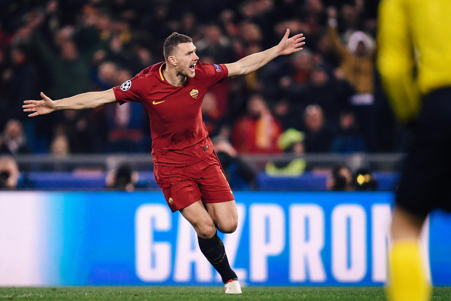 Roma’s Bosnian striker Edin Džeko celebrates after scoring during the UEFA Champions League round of 16 second-leg football match against Shakhtar Donetsk on Tuesday at the Olympic Stadium in Rome.