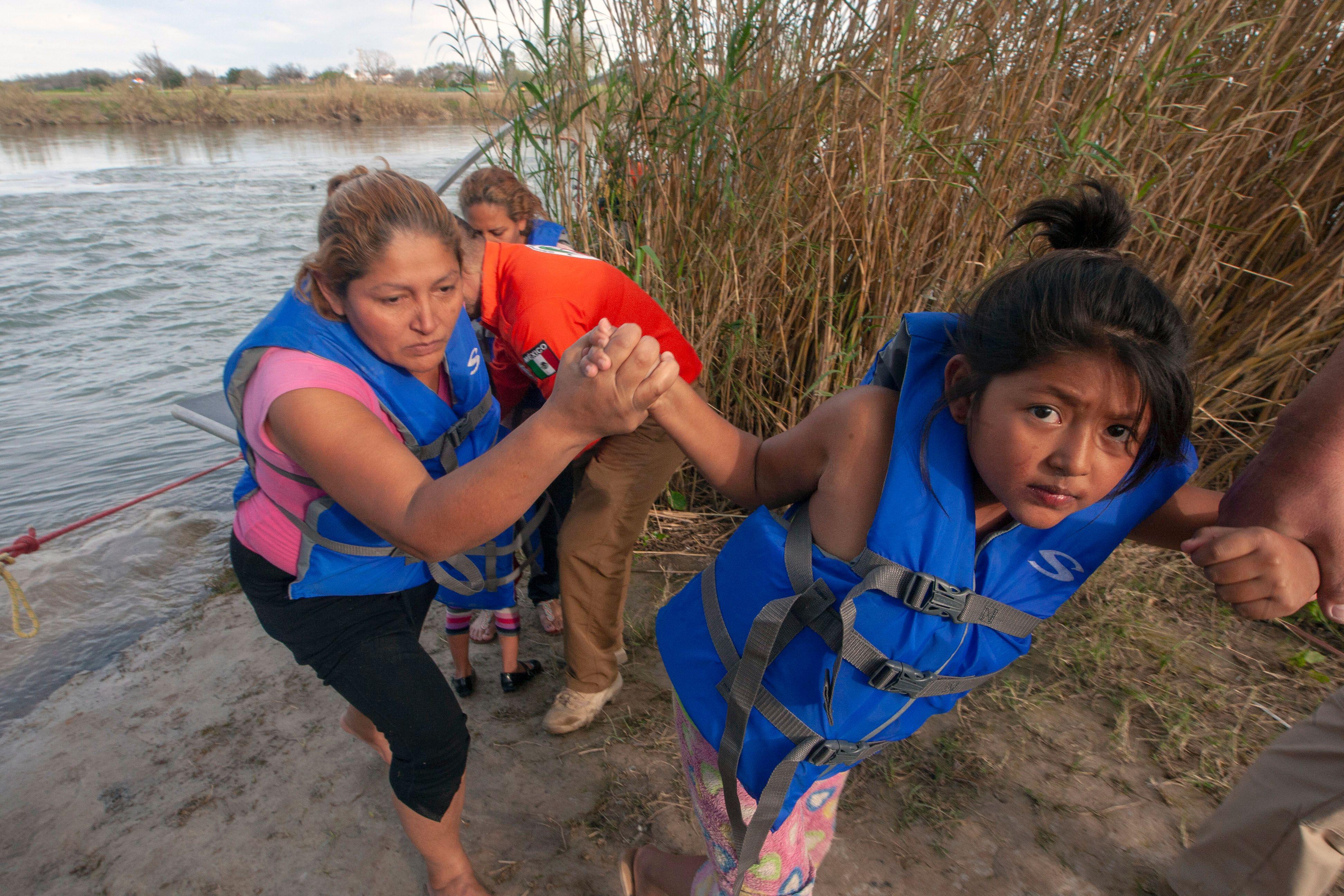 Central American migrants are rescued by members of the Beta group of the National Mexican Institute of Migration, dedicated to the protection and defense of the human rights of migrants, as they were trying to cross the Rio Bravo, which divides the cities of Eagle Pass, Texas and Piedras Negras, in Coahuila state, Mexico, on February 15, 2019.