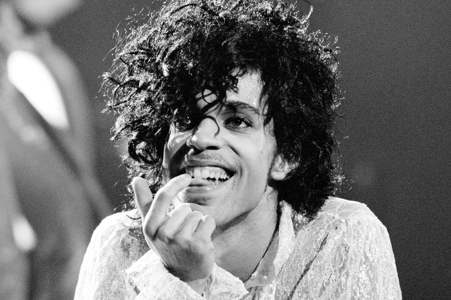 Prince performing onstage.