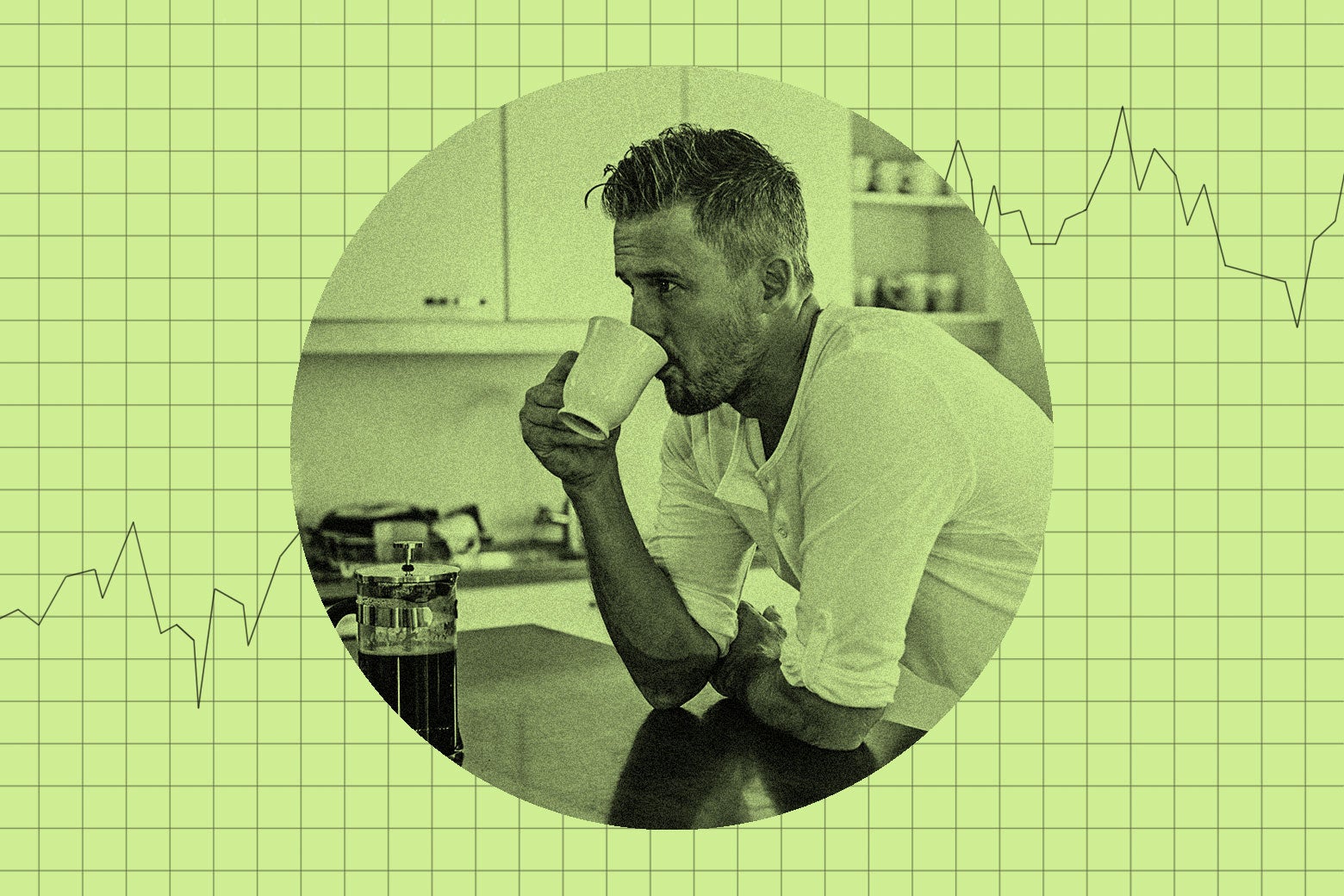 A man leaning against a kitchen counter drinking coffee. He looks annoyed.