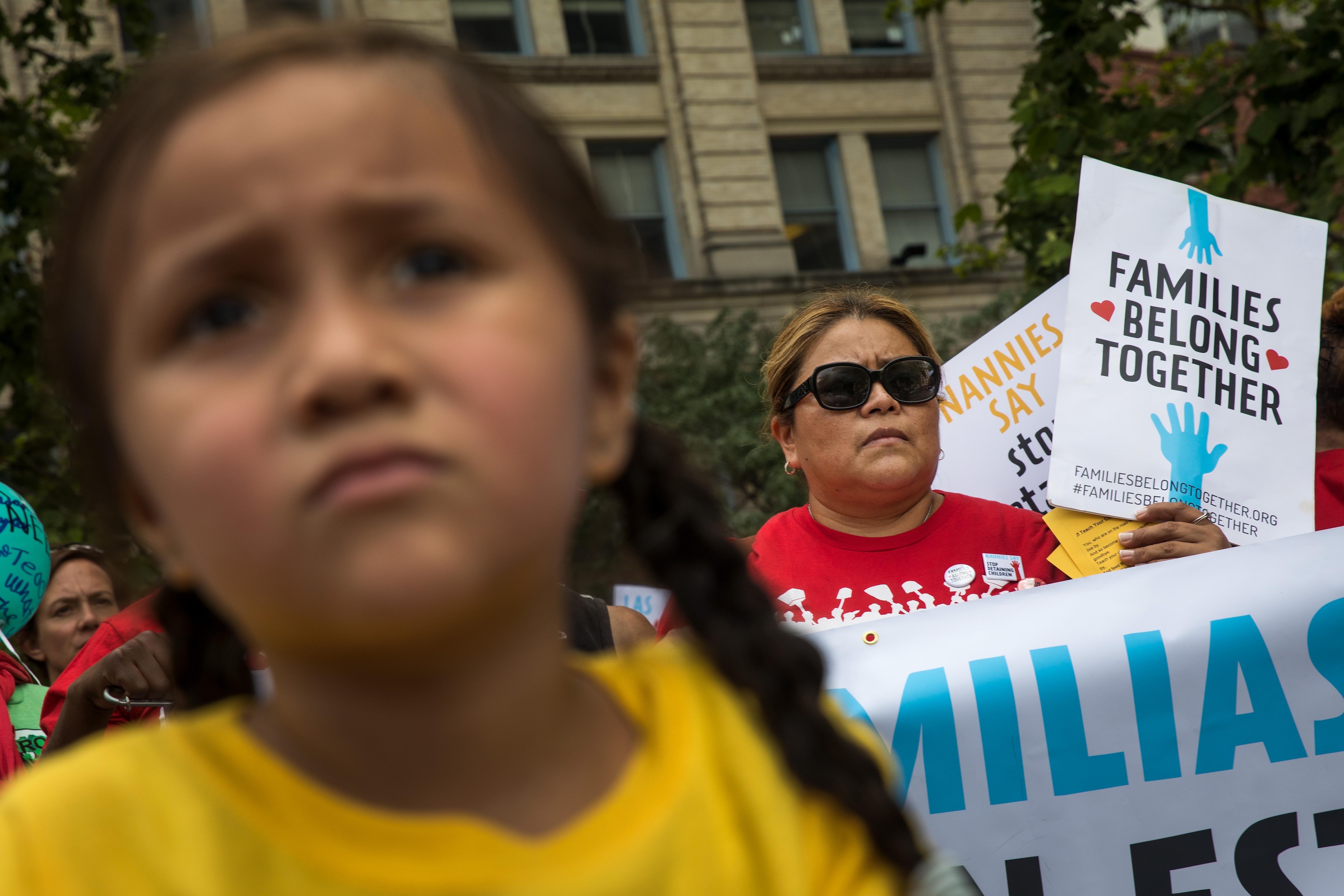 Activists, including childcare providers, parents and their children, protest against the Trump administrations recent family detention and separation policies for migrants along the southern border, near the New York offices of U.S. Immigration and Customs Enforcement.