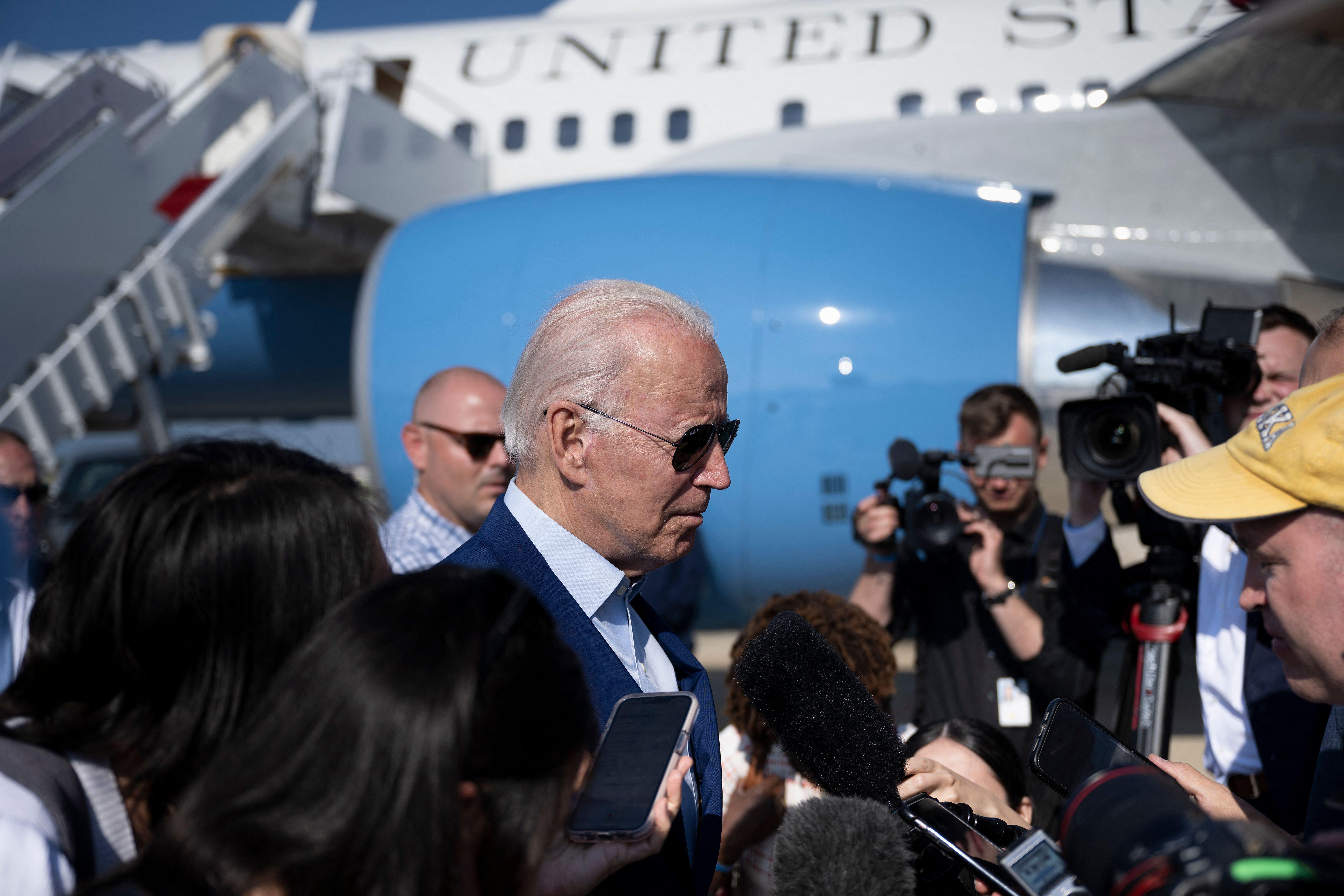 US President Joe Biden speaks to memebrs of the media after disembarking Air Force One at Joint Base Andrews in Maryland on July 20, 2022. - Biden is travelling back to Washington, DC, after delivering remarks on the climate crisis in Somerset, Massachusetts. (Photo by Brendan Smialowski / AFP) (Photo by BRENDAN SMIALOWSKI/AFP via Getty Images)