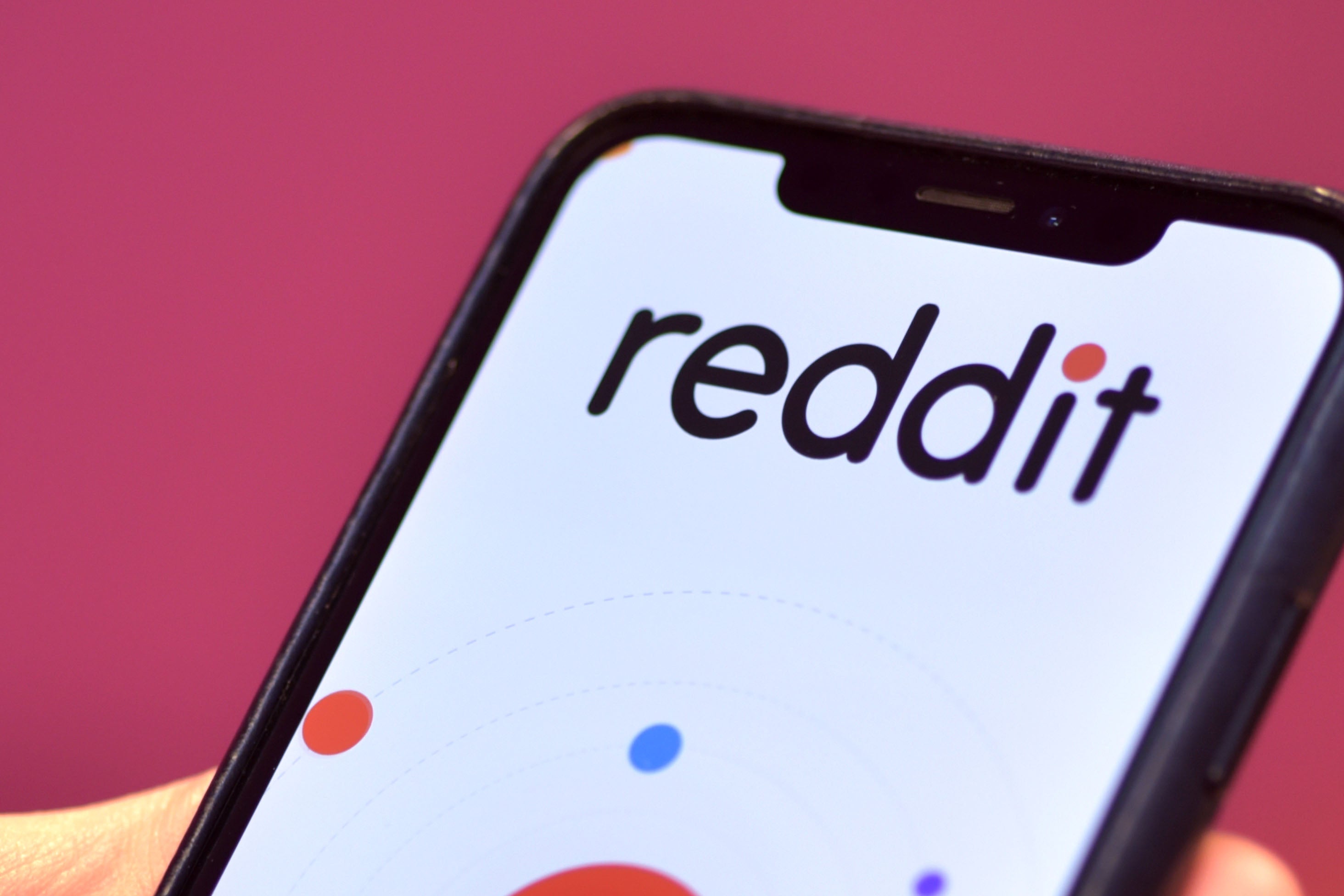 The Reddit logo displayed on a phone screen