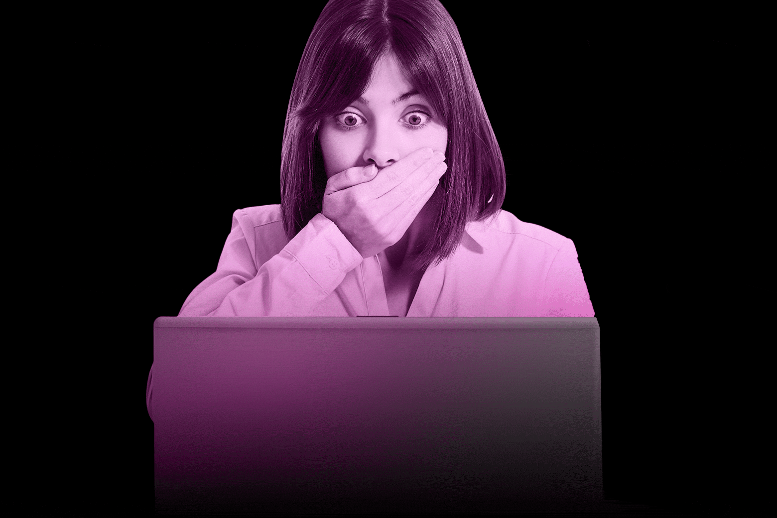 Shocked woman looking at a laptop