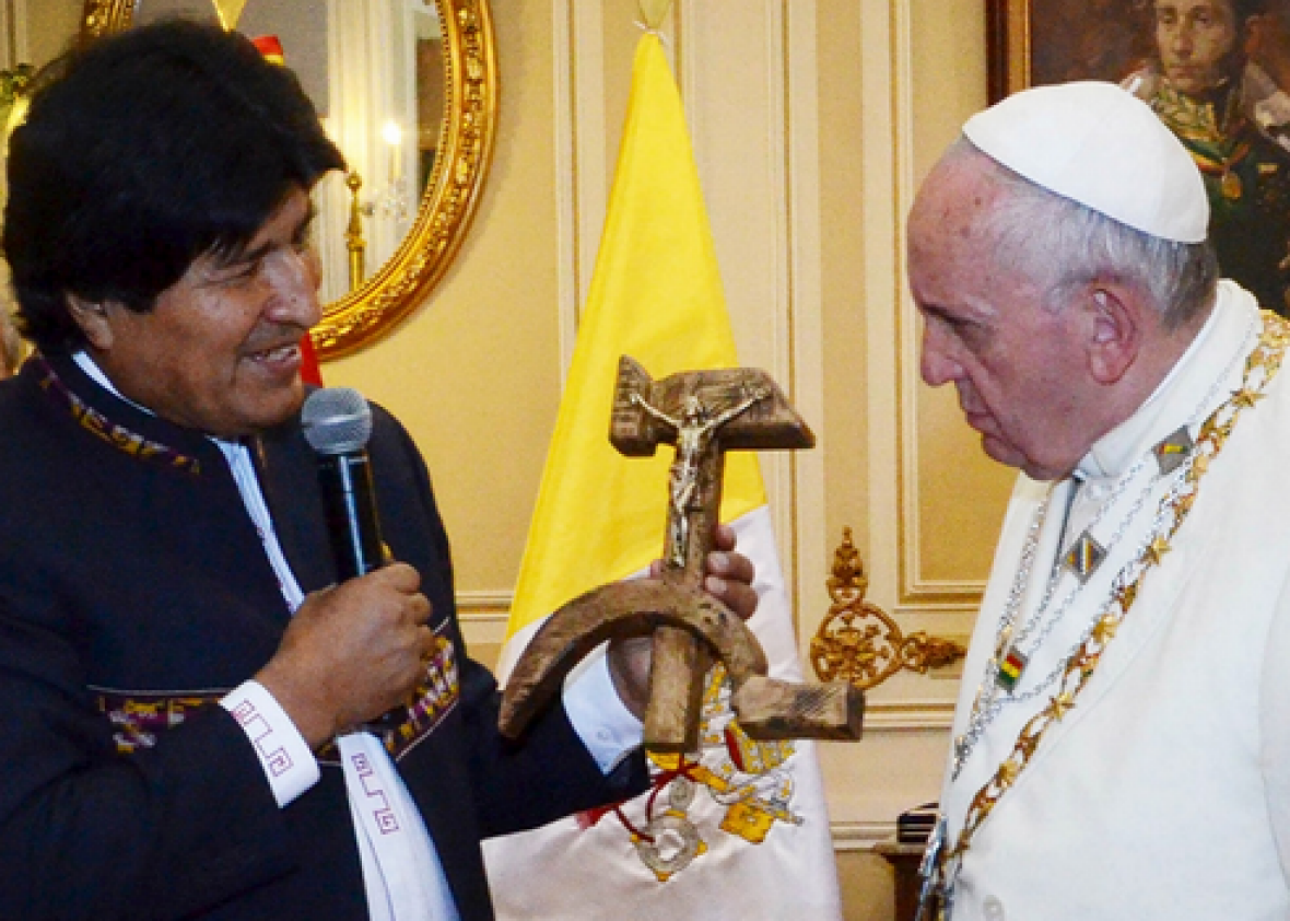 Bolivian president Evo Morales handing Pope Francis a communist crucifix on July 8.