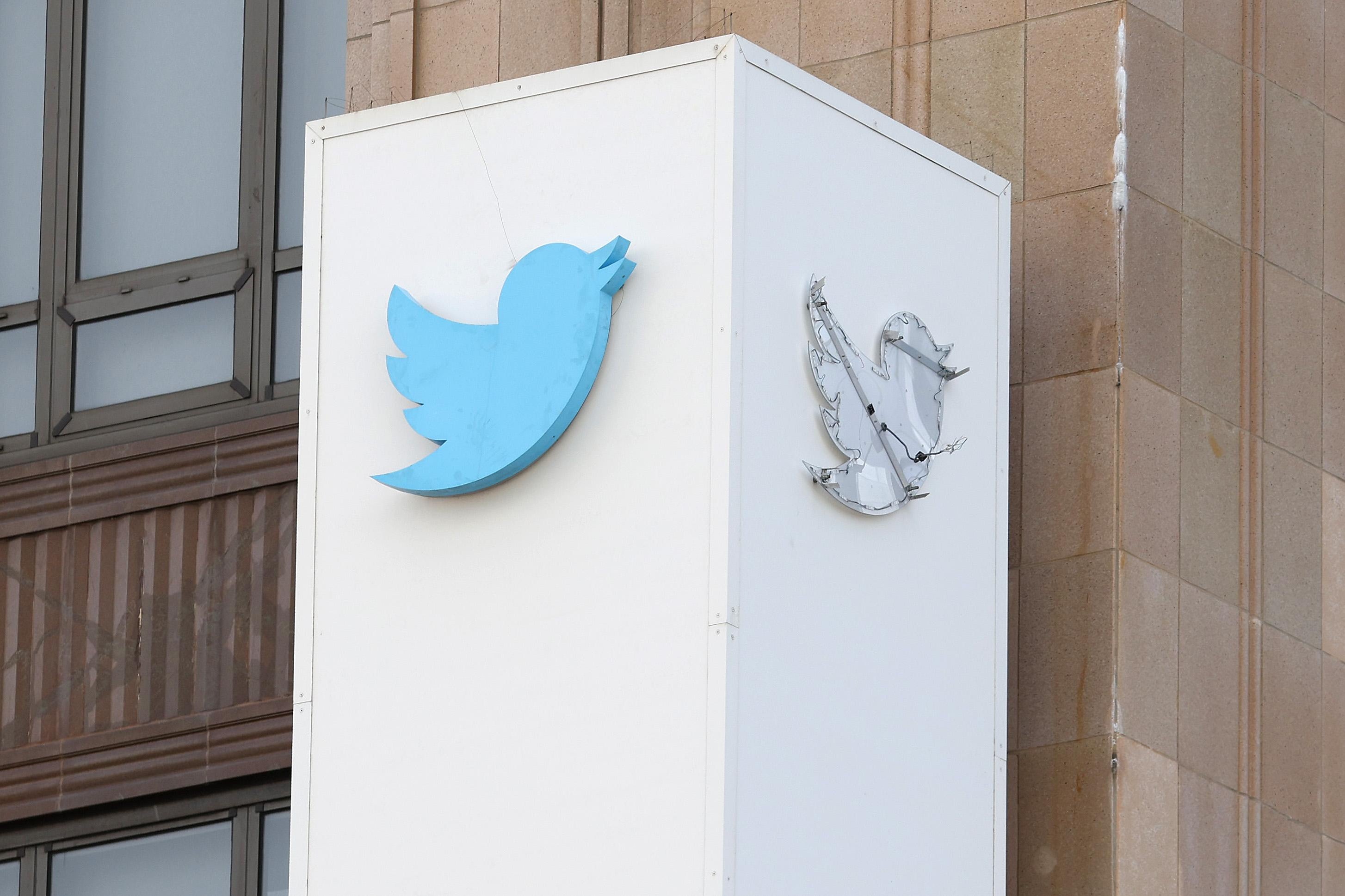 SAN FRANCISCO, CALIFORNIA - JULY 26: The outline of the iconic blue Twitter bird logo is visible on a sign in front of X headquarters on July 26, 2023 in San Francisco, California. A day after San Francisco police officers halted the dismantling of the Twitter sign at Twitter headquarters, one of the blue birds has disappeared along with three of the letters. CEO Elon Musk officially rebranded Twitter as "X" and has changed its bird logo, the biggest change he has made since taking over the social media platform. (Photo by Justin Sullivan/Getty Images)