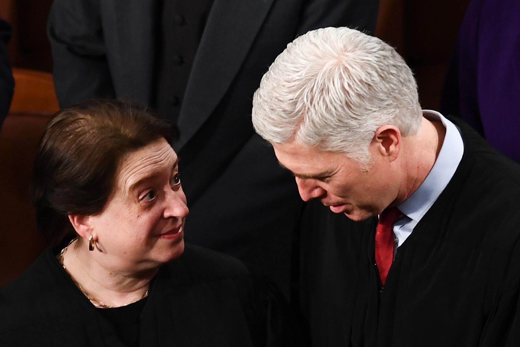 Elena Kagan speaks with Neil Gorsuch at the U.S. Capitol on Feb. 4
