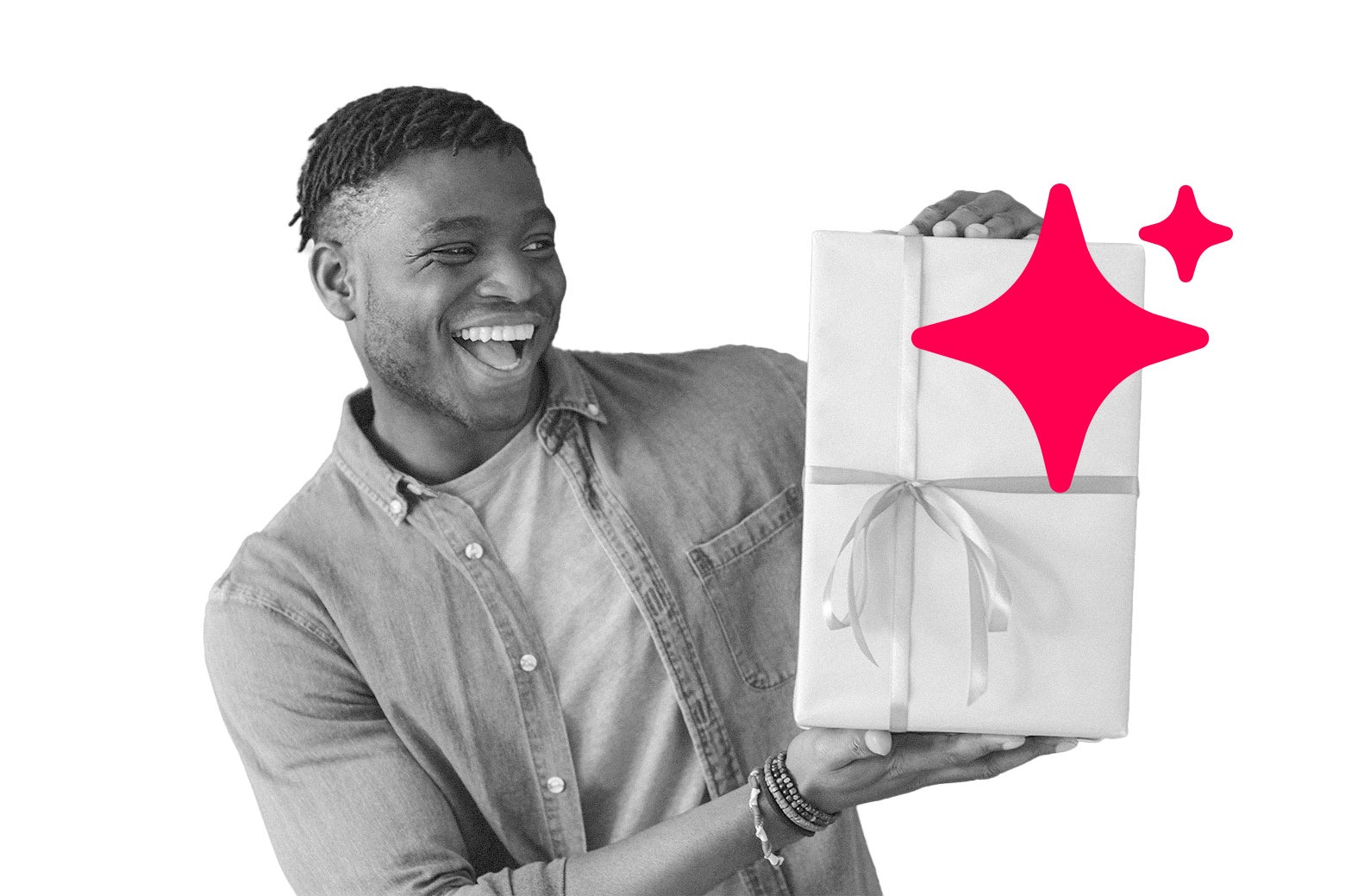 Man holding up a wrapped gift.