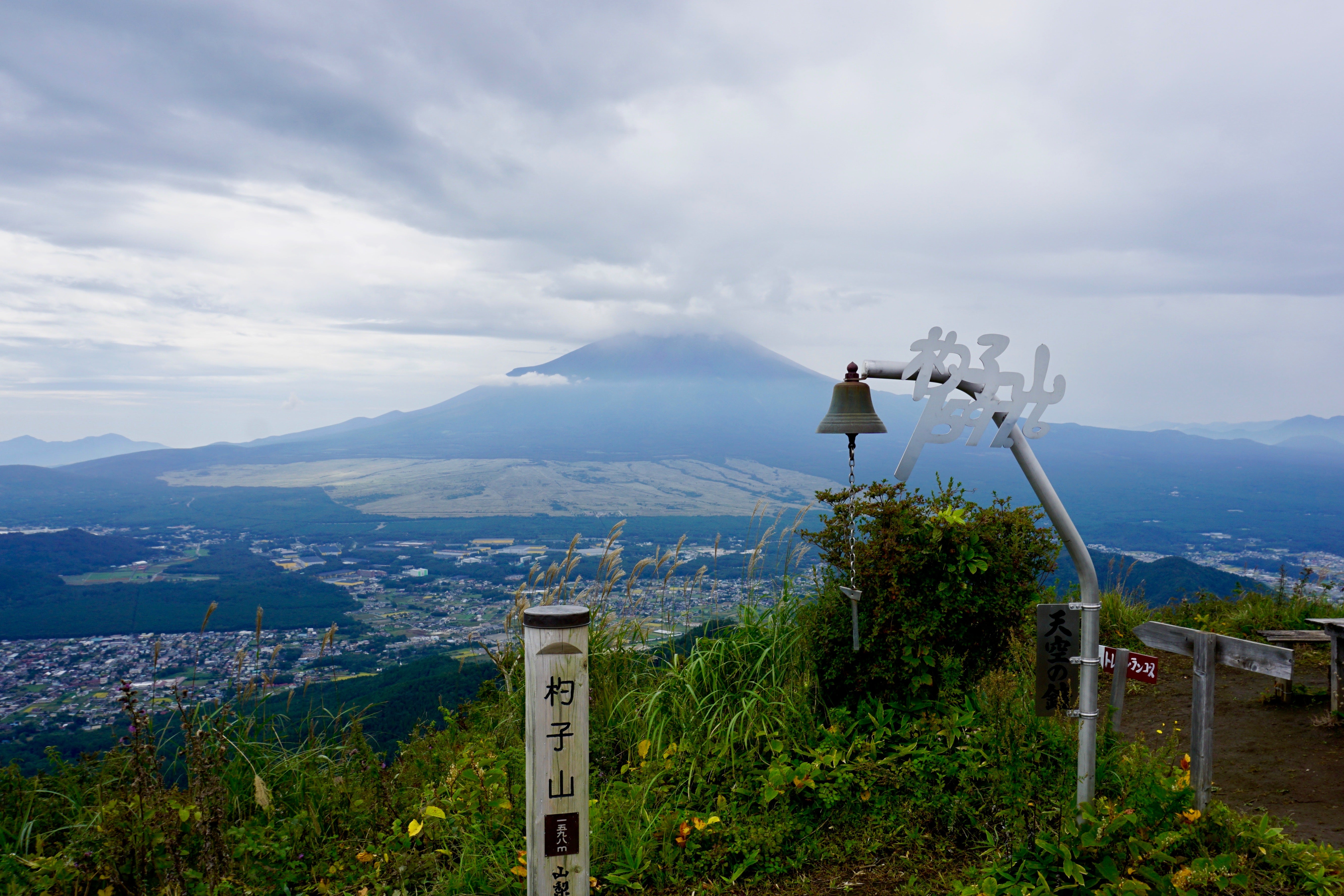 A mountain and the city below it in Japan, seen from high ground
