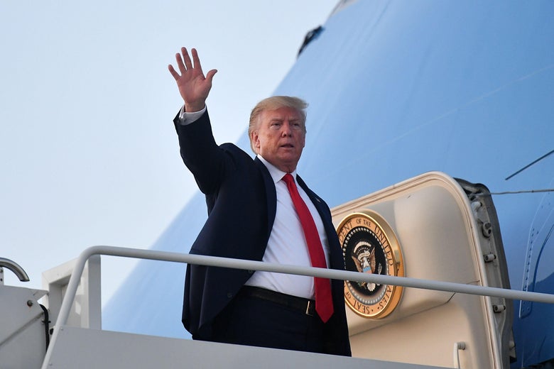 President Donald Trump makes his way to board Air Force One before departing from Cleveland Hopkins International Airport in Cleveland, Ohio on July 12, 2019. 