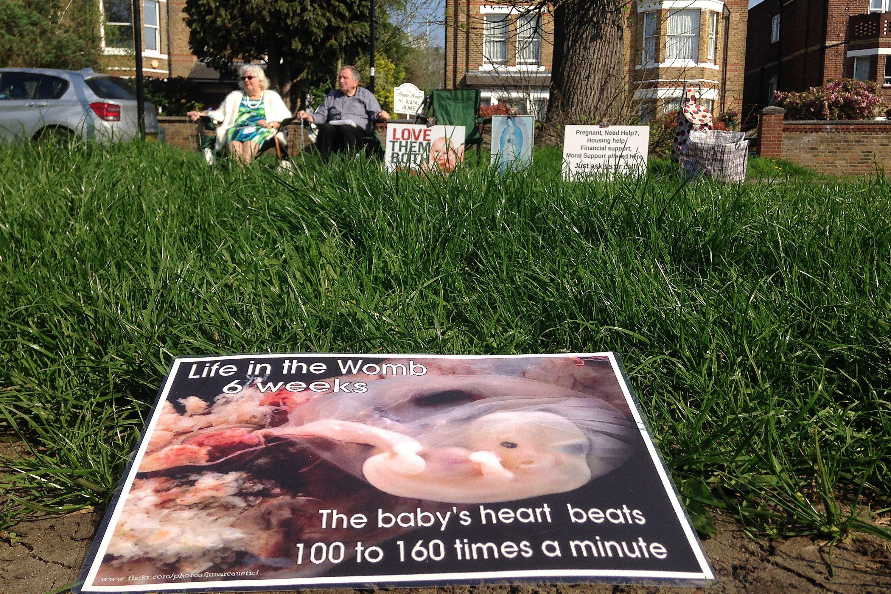 Colleen Wallace (L) and Eamonn Gill, who oppose abortion attend a pro-life vigil on the street outside the Marie Stopes clinic, that offers contraception and abortion services, in Ealing, west London, on April 21, 2018. - A ban on pro-life protests outside an abortion clinic in London came into force on Monday in a first that pro-choice campaigners hope will set a precedent for the country. (Photo by ALICE RITCHIE / AFP)        (Photo credit should read ALICE RITCHIE/AFP/Getty Images)