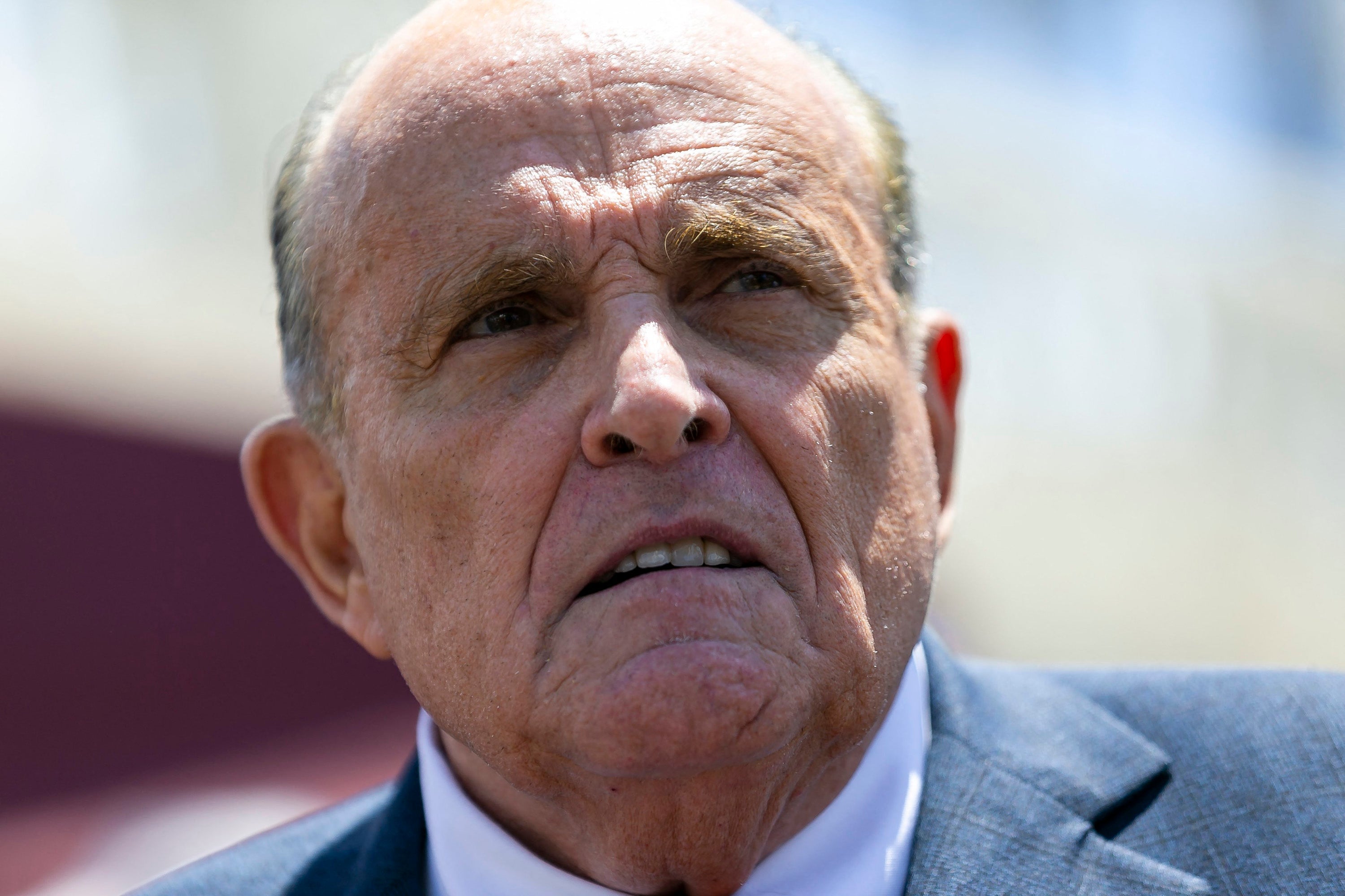 Close-up of Giuliani looking concerned