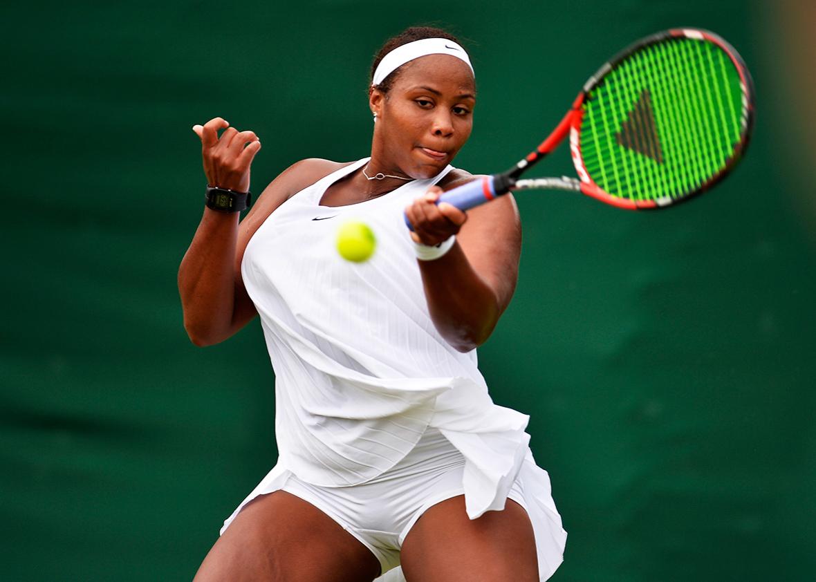 Taylor Townsend in action against Olga Savchuk of Ukraine during the 2016 Wimbledon Qualifying Session on June 21, 2016 in London, England.  