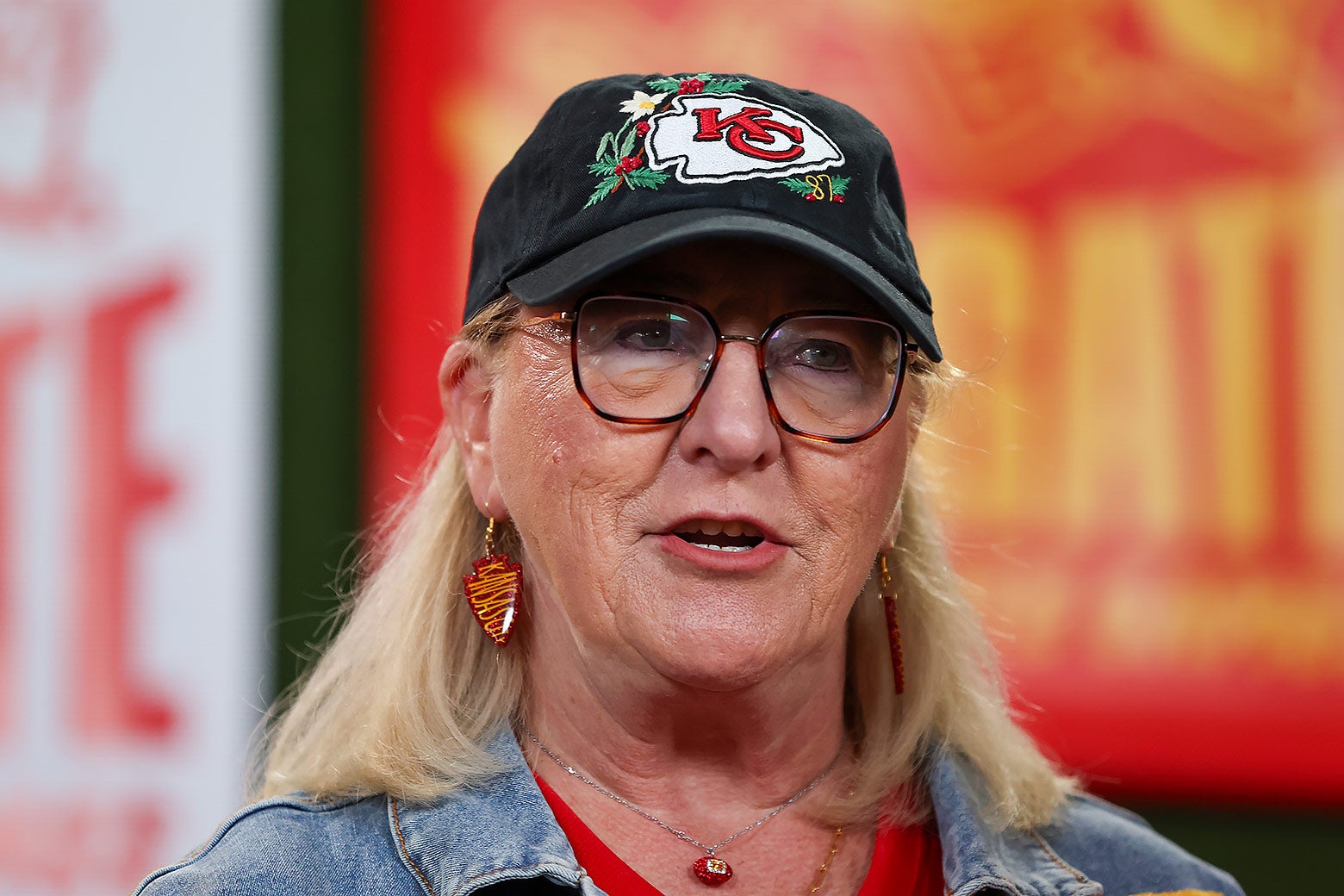 A close-up of Travis Kelce's mom mother Donna Kelce wearing a Kansas City Chiefs hat 